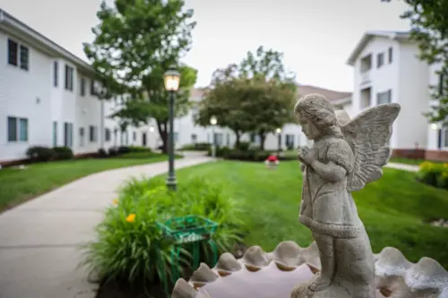 Fountain View Senior Living birdbath fountain in assisted living secure outdoor courtyard