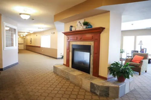 The Heritage at Northern Hills assisted living lobby fireplace